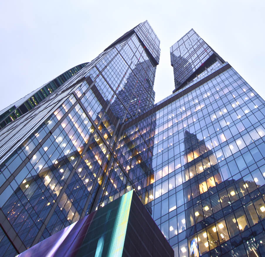 Glass office towers viewed from below